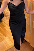 The mid-section wrap makes this a dress you can wear all night! the back is smoother & flat to my body & the slit is actually quite high, I had to be aware when sitting. Overall, it's a very comfortable fit and I got many compliments! straps are adjustable too! In this picture, I'm wearing a strapless bra and fashion tape in just the middle of the neckline. - Justine H.