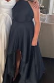 So this dress definitely runs small,  my daughter is usually a women's medium and I had to size up 2 sizes to an XL and that fit ok - Melissa K.