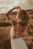 I loved the fit and simplicity of this dress. The material is pretty thin but I was going for a light, airy vibe and this dress worked out perfectly for the photos I had scheduled. It looks DREAMY in every photo! The back makes the whole dress. - Michaela C.