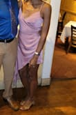 The dress fits true to size and looks exactly how it does online. I would definitely recommend it. - Gisel P.