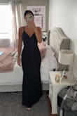 It honestly is a great thick material, I definitely could have fit into a small but that would've been too tight. It is the perfect length as I am 5'8. Anyone shorter would have to get it altered forsure. - Natasha A.