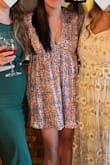 I ordered this dress last minute for a bridal shower and fell in love the instant I put it on! In some things, I wear a medium, others a large and when I placed this order, they didn't have a large available so I ordered a medium and it fit perfectly. Being 6 months postpartum, I loved how flowy it was and didn't feel like it was too short like some of the reviews suggested. Will definitely be wearing this as often as I can! - Brianna S.
