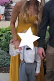 I bought this dress to wear to a fall wedding! The color of this dress is amazing! This dress runs slightly larger. I wore my tallest heels and it was still dragging on the floor. If I would have had more time before the event, I would have gotten this hemmed. Overall, awesome dress, and lots of compliments! - Brittany W.
