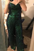 I ordered this originally with a lot of skepticism and fears of the site not being good or it getting here later than what I needed, along with what it would actually look like. Though, when it arrived to my house, it looked exactly like it was advertised as well as it fit exactly how I ordered it. This is a beautiful jumpsuit for any occasion that you might want it for. Not too flashy but not too dull. I've already gotten tons of compliments just wearing it for an hour. - Ariella M.