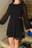 Depending on the dress, I can wear a size x-small or small. I ordered both for this dress and kept the small. The arm length and chest portion were perfect, but the waist felt just a little too restrictive in the x-small. Love the style though and am very happy with the quality! - Eliza P.