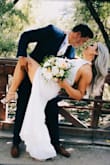 This dress was sophisticated with a sexy slit up one side of the leg, which I loved. The beautiful high neckline made it feel/look more formal, and the material maintained its shape throughout the day which was captured in the wedding photos. I felt absolutely stunning! Thank you, XoXo Alisha - Alisha