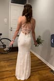 This dress is so pretty and flattering for the body! The back is beautiful and the sequins are very fun! The dress is a bit see-through but not enough to be a big problem. I still decided to keep it and will be wearing it for my wedding. Overall super pleased with the quality of the dress! Super comfortable and I will definitely be able to dance all night in it! - Ella F.
