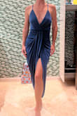 This color was a little darker and more "royal blue" than expected but it was a beautiful shade. The fit was a bit snug however the fabric stretched in all the right places. Such a great dress. Definitely plan on getting another one or two in other colors. :) - Courteney D.