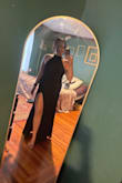 Love this dress! It fits perfectly but the slit is very high. Like one wrong move and your business is out high. Would have to size up in order to close it as it's pretty form fitting on the thighs. - Katelyn K.