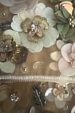 I bought this bag for a wedding. I didn't use it 'til the day of, and when I sat down at the wedding, the flowers started falling off. Now, it's past 30 days, and I can't return it. I won't trust this site again. - Tiffany S.