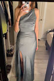 I really wanted to love this dress -- the dusty blue color is absolutely gorgeous and fabric is high quality. Unfortunately I will be returning for two main reasons, the first being that the slit is in an awkward position and doesn't fully close, so it looks like it's missing material. There's also too much fabric at the back of the dress which causes it to bulge out. This may also be due to my body shape as I have a short torso and not much booty to fill/straighten out the dress. - Tina N.