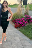 It fits true to size and made me feel sexy in it. It does ride up a bit and the straps keeps falling down while I'm sitting. The front part can be very exposed if you bend down. Overall happy with the fit. - Nareeya V.