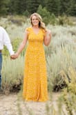 I wore this for my engagement photos and they turned out stunning. I typically am a size M but the Large was just right around my waist but tight on my chest since there is no give in the material. I am disappointed because having only worn it once, the outer material is so thin the seam on the side of the waist pulled apart. The seams seemed questionable and were already starting to look like they were going to fray when I put the dress on, but I thought it would hold up. The whole side ripped and the front has little threads popping out all over the front seams. I am really disappointed that I paid almost $100 for a dress I only got to wear once. I am not sure a seamstress can fix the way it pulled apart. Thankful I got my photos, but sad I don't get to wear it again. - Courtney G.