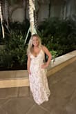 I wore this for my engagement photos. I'm 5'2, so it was longer on me than on the model but was perfect with heels. - Jaime F.