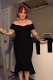 I was a little nervous because I read some reviews that said the dress ran large, and some ran small. I am usually a size 12/14 with wide hips and a big butt. I ordered a size L and it fits me like a glove! I honestly probably could have gotten a M. I'm wearing this to a friend's wedding and I cannot wait to show off in it! Definitely recommend going a size smaller if you're in between sizes. - Chelsea L.