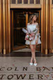 I got so many compliments on this dress when we decided to elope at the courthouse. It was perfect. I wore nude spandex under so I didn't have to worry about it being too short. - Kayla M.