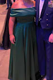 The dress fit like a dream! It has 3 layers, a soft inner layer, tulle, and the outer almost satin like material. The dress is perfect for a more apple shaped figure. At only 5'2 I had to have a significant amount of dress cut off and hemmed. - Trista E.