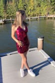Ordered this for homecoming. The stock photo looked a bit mature for a 16 year old, but it's actually really cute! It's lined, and the sequin layer is looser, like some ruching so it's not too tight. We did pinch the straps together in the back, but that was the only alteration needed. Great quality, beautiful color, nice fit, the order came quickly and we're really happy with the purchase. - Jennifer V.