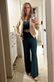 I had to get several inches taken off and I wore high heels with it. I also had it taken in around my hips. I got many compliments and it's very comfortable. I wore it with a belt and blazer for a work conference. - Stacia W.