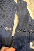 This is such a pretty and classy dress, and I was excited to wear to a family wedding. However, after I put it on and one hour before the start of the wedding, the zipper malfunctioned and came undone exposing my entire side torso. I did not have a backup dress, but luckily a family member had a needle and thread and literally sewed the dress shut on my body. I had to use scissors to cut myself out of the dress at the end of the night and it is now ruined. At this price point, a dress should have a functional zipper. Such a shame. - Mary G.