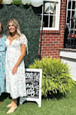 I purchased this dress for a bridal brunch shower, which perfectly fit the theme. I will say it runs a bit big but the tie straps in the back of the dress help it feel more secure! - Taylor R.