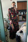 I don't get to say this often but this dress is long. I'm 5'11" and it drags the ground a little without shoes, so it will be the perfect length with heels! I typically wear a L or XL. Since this is a more fitted style, I went with XL. While this makes it a little looser in the chest, I'm glad I did because I don't know if I would've been able to sit in an L. The fabric has little to no stretch. - Brittany N.