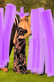 This dress is stunning and I received tons of compliments on it! I ordered a small and a medium and based on the recommendations of the fit guide on the website and after trying both on, I kept the small. About an hour into the wedding, the seams were torn about 2 inches along my thighs on both sides. Such a bummer I won't be able to wear it again. I guess it was just cheaply made. Since the color is dark, no one could tell but I was pretty bummed. - Alexandra B.