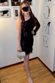 Ordered the dress for my daughter to wear to homecoming. She's usually a Medium, but based on the reviews of other dresses, I sized up and got her a Large. It STILL felt wayyy too small. She sat down once, and the feathers at the bottom began to fall off. - Jasmine T.