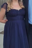 Great dress. True to size. I would recommend this dress. Good Material - Jessica B.