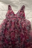 I loved it! It's better than the picture shows but it runs TOO SMALL! My sister is skinnier, she usually wears a size M, and it didn't fit her too. - Nataly V.
