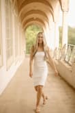 I LOVED this white dress! I wore it for my doctorate graduation and pictures. The length was perfect for more of a professional look. The fabric and material were comfortable and flattering. I got so many compliments! - Heather S.