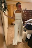 It looks really great on. The top is a little tight but it's not too bad. An XS was preferred because the pants fit better than a size small. - Paula S.