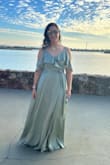This dress wraps around your body so it fits perfectly! The fabric is good quality and feels very soft. - Silvia S.