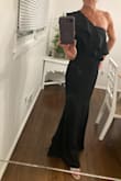 This dress fit me like a glove and highlighted all the right areas. The length was perfect and the dress is just really made well overall. I've received many many compliments on it and I feel great in it. Great price and quality, well-fitting dress. - Heather M.