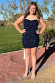 It hugged in all the right places but was not overly tight and it was stretchy so it was comfortable, and the best part it was not scratchy on my skin! I loved it and I received a lot of compliments on the color and the fit. - HEATHER S.