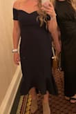 Lovely dress for a wedding! Flattering. I wore spanx bc I'm postpartum. Needed to be ironed on the bottom when I got it but no big deal. Recommend! - Samantha S.