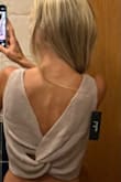 I love this top. It's comfy and the back is so cute. The material is soft and not too thin so it can be worn on a cool night. The bottom part fit a bit differently than I thought if anything I wish the bottom was a little more fitted but doesn't really matter. I haven't worn it out yet just tried it on but so far love it - Erika Z.