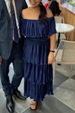 Dress was a bit heavy since it has much material, but it looked so great and I got so many compliments on the style and color! The waist was a bit tight for me however I wouldn't have upped the size since everything else fit perfectly. Dancefloor approved and kept me warm in a fall night. - Elizabeth R.