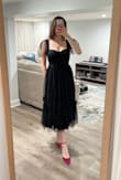 I love this dress, but do wish there was a Medium -larger bust and a medium-smaller bust size. Because I have a large bust, the straps are a little tight and the top feels kind of restricted. But it fit better than I expected! Zipper gets stuck at one point in the back. The material is really nice and seems high quality. - Courtney K.