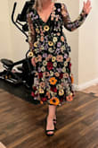 Wow, this dress is a show stopper! I ordered a large and it fits me like glove (5'5 165-170 lbs). The dress is very well made and looks like couture. If you're looking for something beautiful and interesting to wear to an event, this one is sure to get lots of love! - Rachel E.