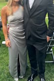 This dress was nice and made out of quality fabric. I found the waist to be pretty tight. I'm only 5'1 and the slit was way too high, I felt very self-conscious walking around and especially dancing. It's more of a wrap dress style slit. Still a quality dress and great if you want to show off your legs. - Tori K.