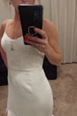 It was a beautiful dress that fit lovely up top. Love the fabric and sequin! However, I don't think the bottom of the dress was flattering on my figure. - Chelsea T.