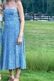 I recently purchased the Charming Dedication Blue Floral Sleeveless Lace-Up Midi Dress, and it's such a fun addition to my wardrobe. The lace-up detailing adds a unique touch that sets it apart from other dresses. Not only is it stylish, but it's also incredibly comfortable. I've received so many compliments every time I've worn it, and I feel confident and chic in this dress. It's a fantastic choice for any summer occasion. Highly recommended! - Faith B.