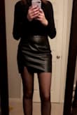 Definitely size up! I got a small and it was a bit too short and tight for my liking. - Faith B.
