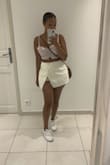 I went sightseeing in the skort. Very comfortable and chic. It did shrink slightly so do not put it in the dryer. - Nia M.