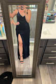 Listened to all the other reviews and decided to size down. I ordered an XS and it fit perfectly. The slit is not too high and adds a bit of sexiness to the dress. Velvet material is beautiful. I have a small chest and had to tighten the straps as tight as possible. Other reviews mentioned that instead of the extra fabric going to the back of the straps, it comes forward which is very odd. Length is perfect for shorter girlies. No need to hem, so this dress is perfect if you're crunched for time! - Sierra G.