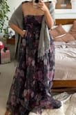 The dress is gorgeous and the floral print in purples and maroons is perfect for a fall wedding. The cut at the waist hits at the right spot. A little tight through the corset top but needed since it is strapless. - Alicia O.