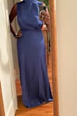 I ordered this for a formal event but the color is a little more muted than what's shown online so decided to return it, but I liked how silly the fabric was and that it had slits on both sides, making it a little sexier. Otherwise, it's lovely and conservative. - Rachel C.
