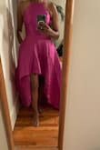 This is a fun, versatile dress. I'm wearing it to a nonprofit gala where the dress code is Cocktail but wanted to be a little more fancy. The short front and long back are fun - the back actually has a lot of fabric and makes you feel like you're in a Victorian-era gown but in a good way! I'm 5'3" and With heels, it's a good length (the back just barely touches the ground) - some people might want to get it hemmed but I'm fine with it. The top is fitted and love the defined waist. Very flattering and I can't wait to wear it! - Rachel C.