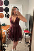 It fits perfectly and it looks so cute! It's not itchy and is extremely flattering. Totally recommend. It is more open in the boob area than I thought but it still looks so nice! - Maria R.